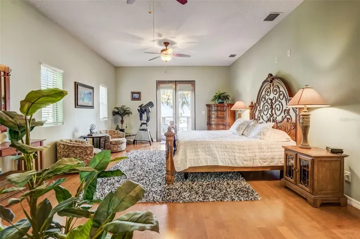 Master bed, balcony, lake view