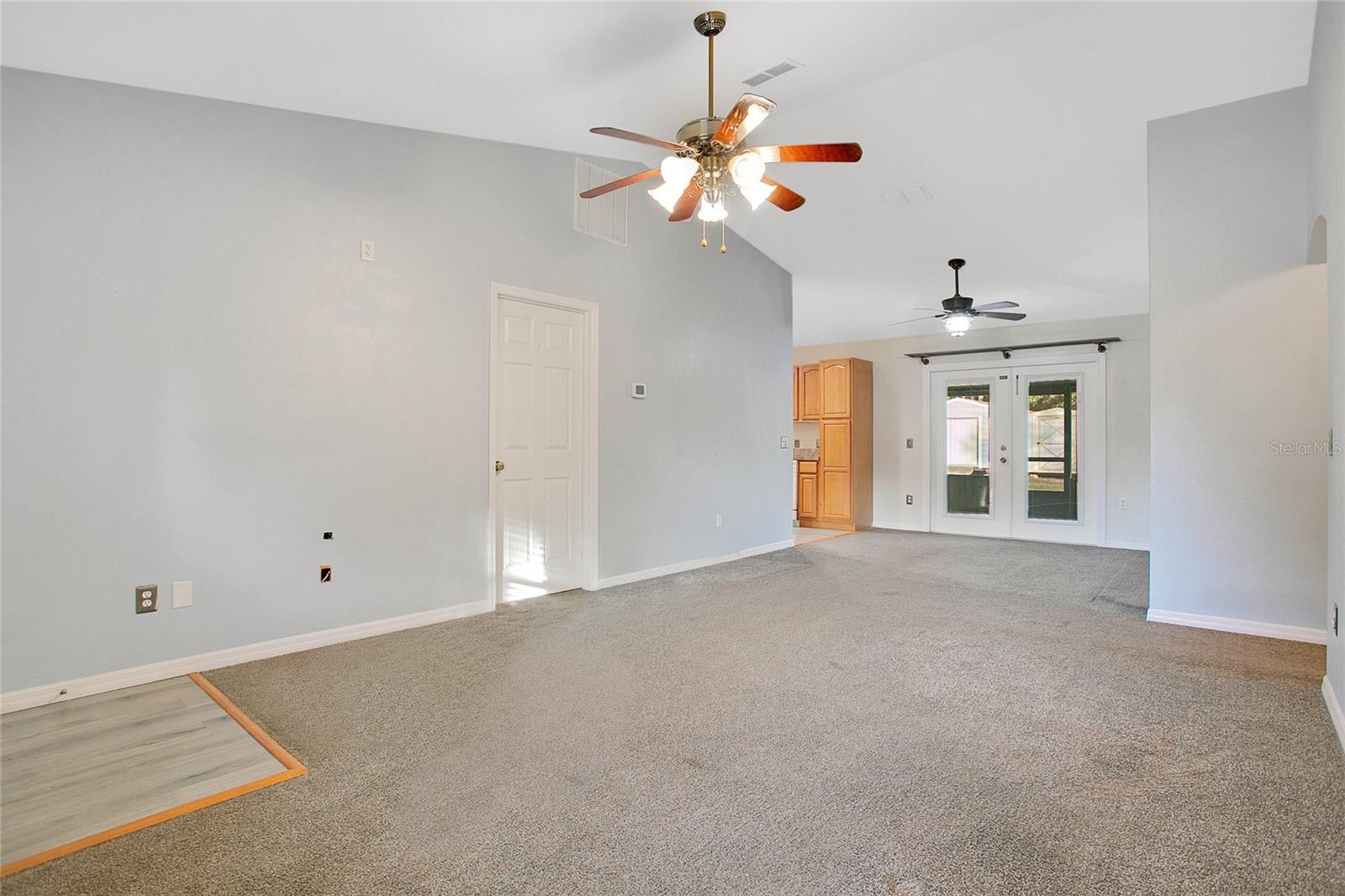Front entry has vinyl flooring space before entering the Living room.