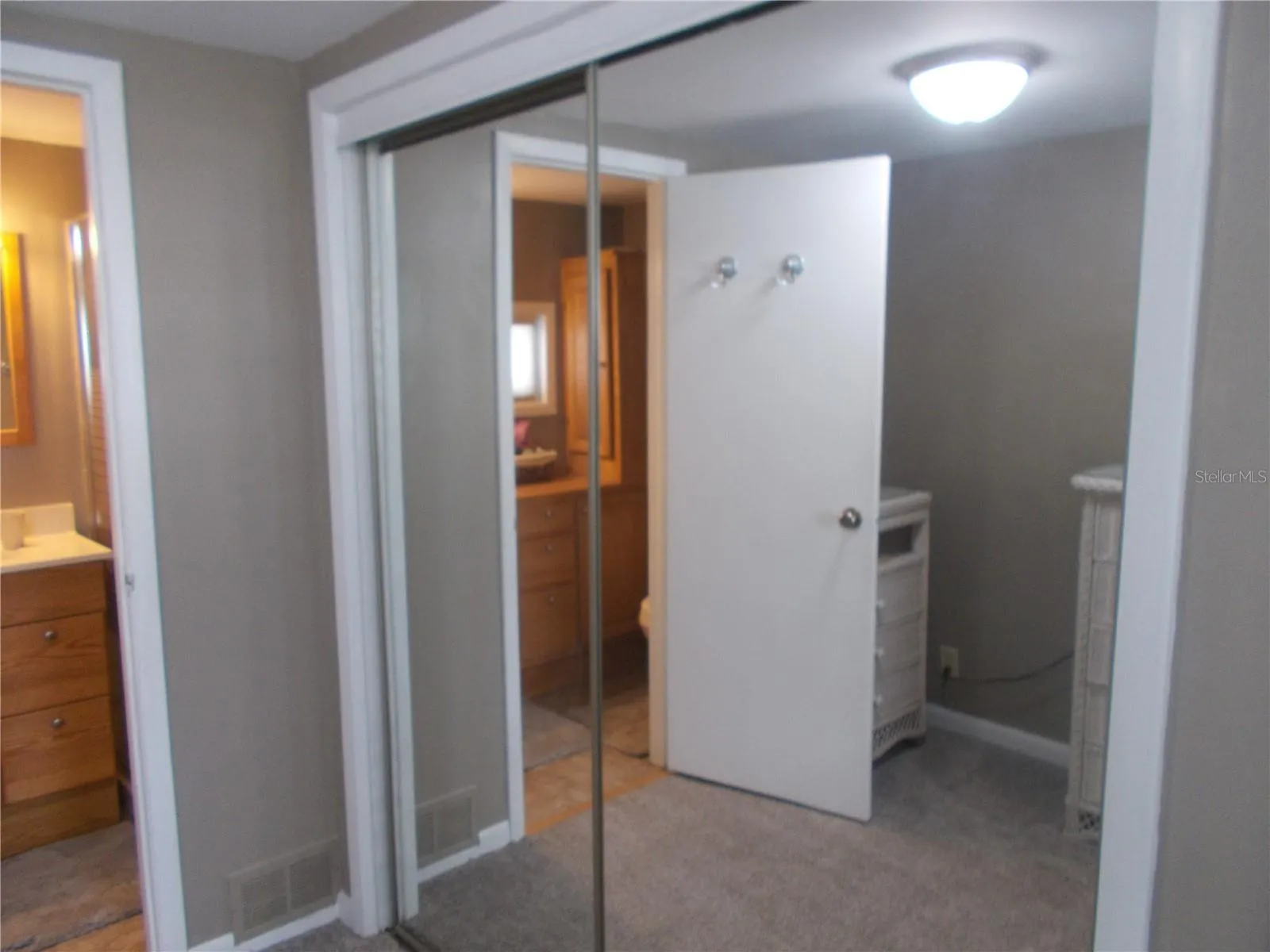 Mirrored closet in Master Bedroom