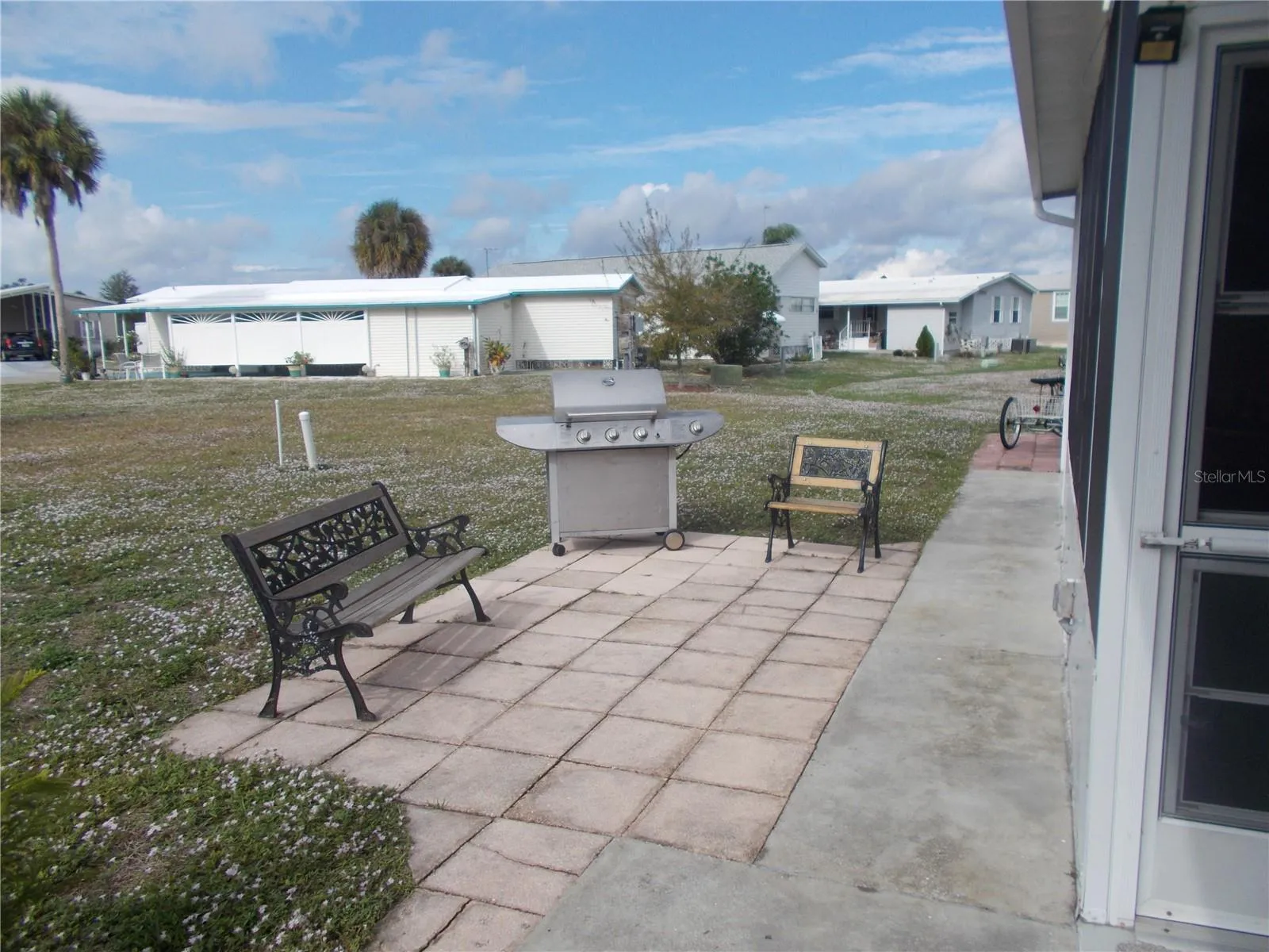 side patio on left side of home