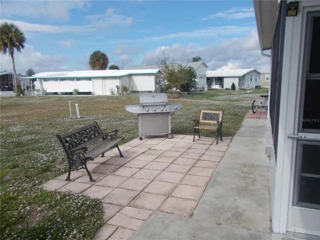side patio on left side of home