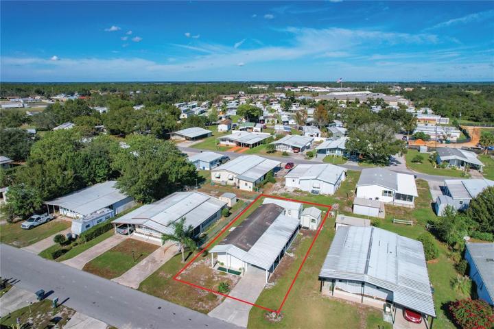 Aerial of the home and workshops, the home does need a new roof.