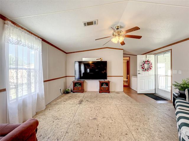 Living room TV and hardwood side tables underneath will stay!