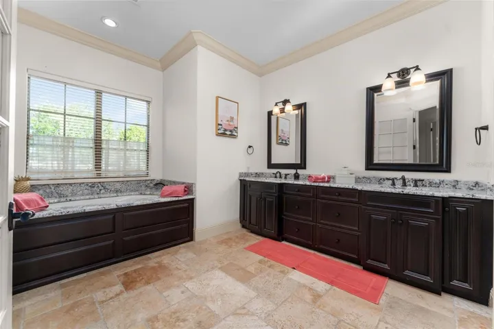 Master Bathroom: Shower, Bath tub, Double sink, toilet.