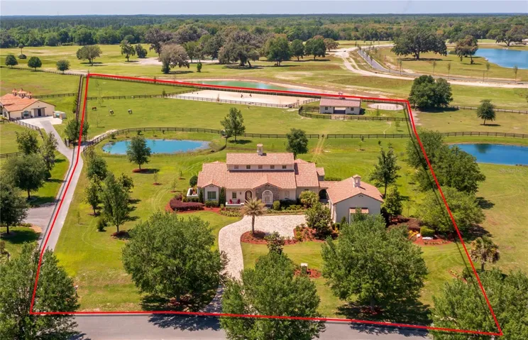 Aerial view showing the 5.34 acres property