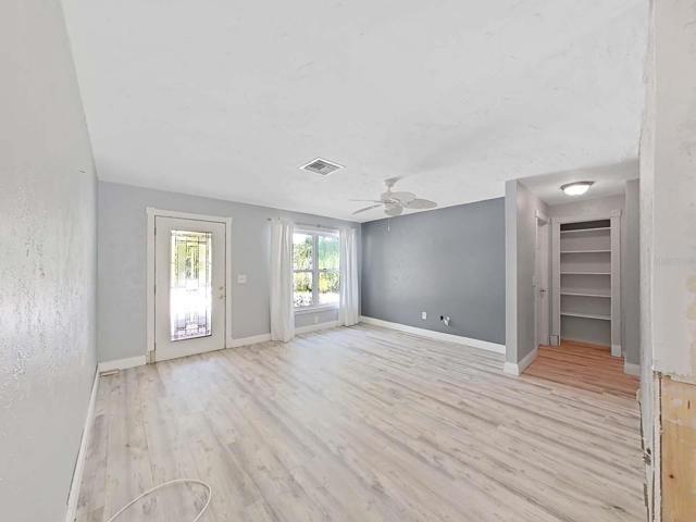 Living Room and linen closet in hall