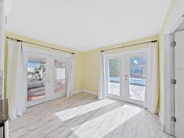Dining area off the kitchen leading to the pool are and screened patio