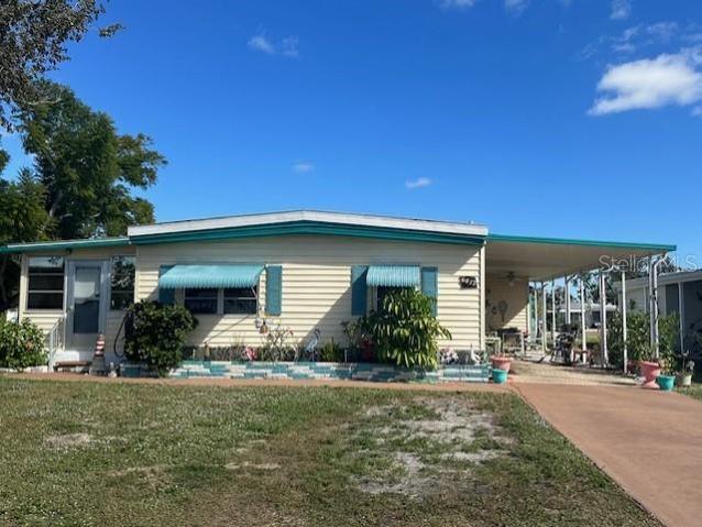Double Wide with Car Port on an Oversized Lot