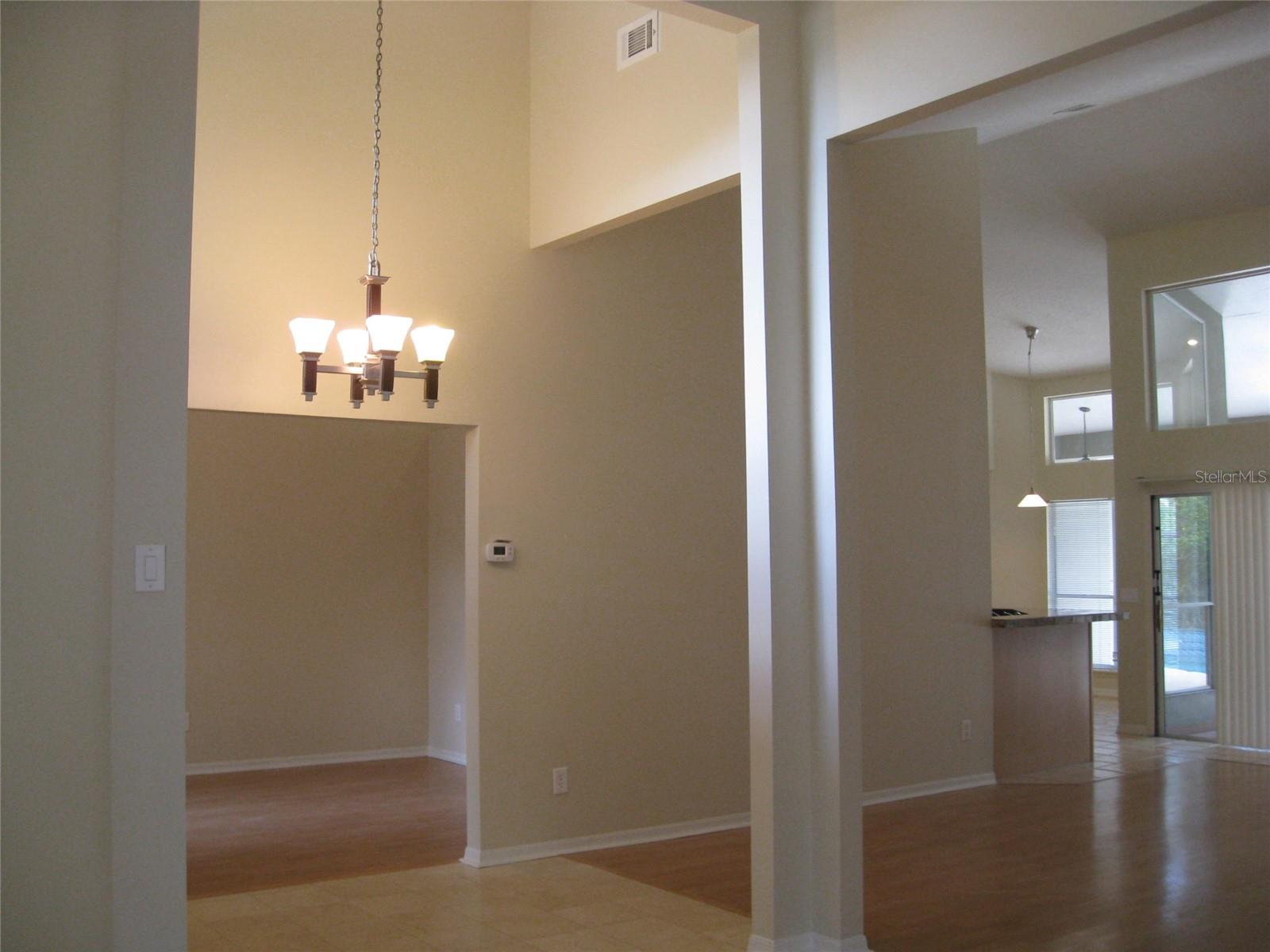 House Entrance overseeing Dining Room, Family Room and Kitchen
