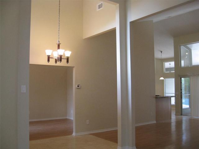 House Entrance overseeing Dining Room, Family Room and Kitchen