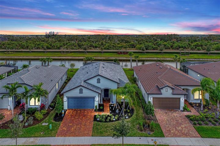 Twilight Front of House with Water View