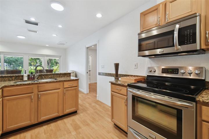 Stainless steel appliances in downstairs kitchen.