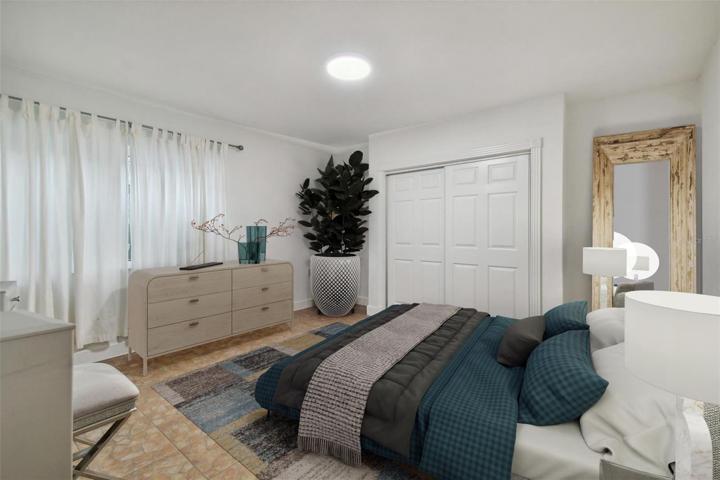 Downstairs bedroom - digitally staged