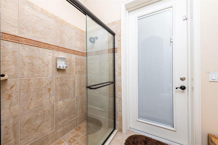 Guest Bath Opens to the Pool and Sauna