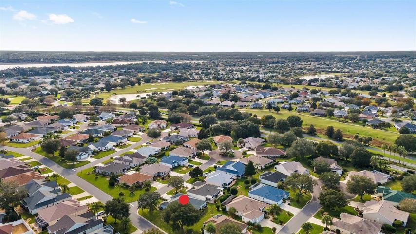 AERIAL - Buena Vista Blvd (through center), Palmer Legends Championship Golf - Cherry Hill Nine (center), and Lake Miona (back left)