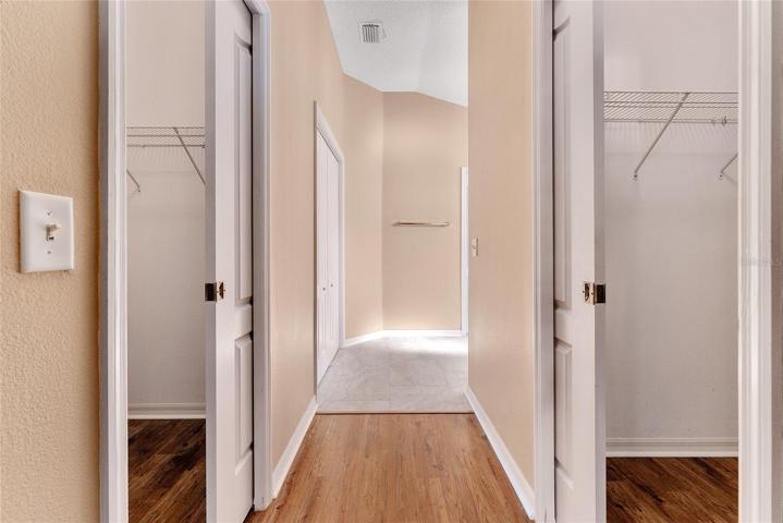 PRIMARY BEDROOM - View of double WALK-IN CLOSETS