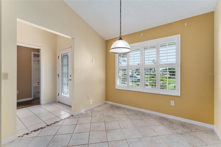 BREAKFAST NOOK - View shows GUEST WING & FOYER in background.