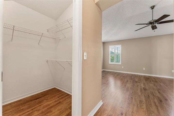 PRIMARY BEDROOM CLOSET (R side)