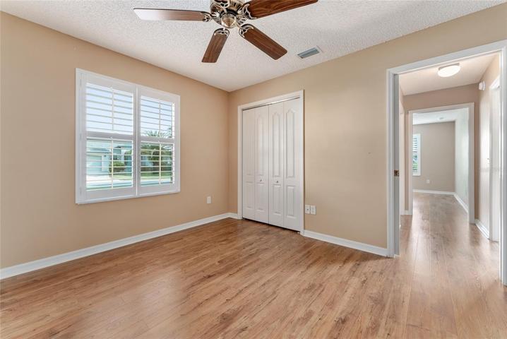 BEDROOM #2 - View of CLOSET & GUEST WING hallway