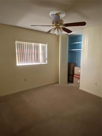 3rd bedroom with closet, and ceiling fan/light