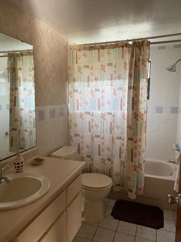 2nd bathroom has tub/shower combination and a window in that area.