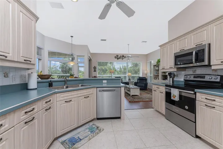 The kitchen has ample cabinetry and countertop space!