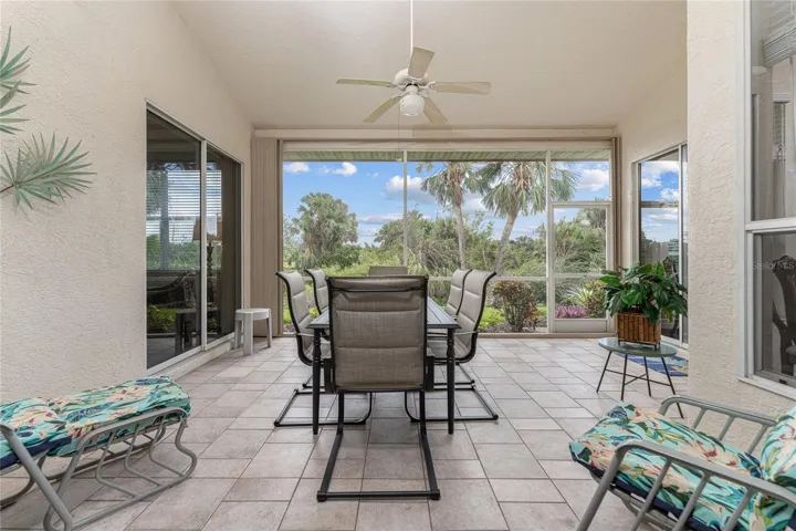 Screened lanai is a great place to watch the golfers just over the pond!