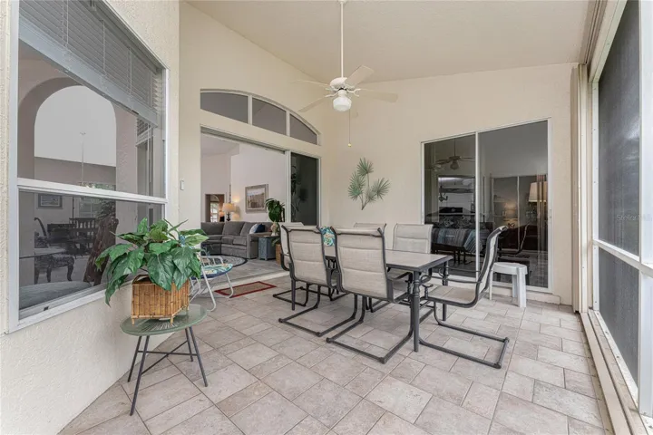 Pretty tiled flooring and a ceiling fan add to your enjoyment