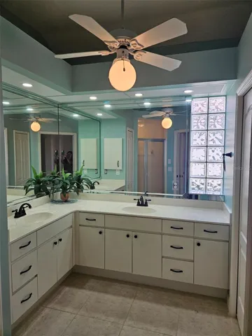 Master bath has a very large vanity w/new hardware and double basins with new oil rubbed bronze fixtures.