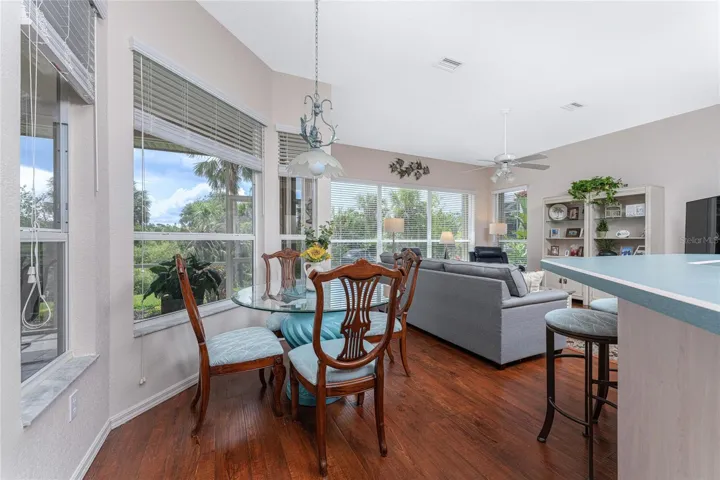 Lovely engineered hardwood is in the breakfast nook and family room.