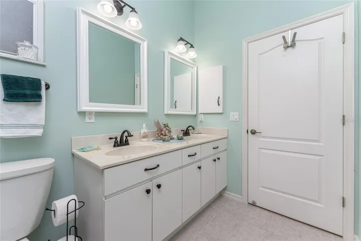 Mirrors, light fixtures and toilet have all been updated