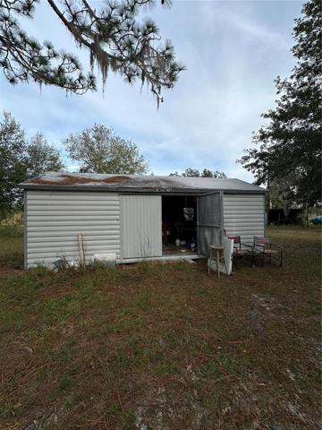 Larger shed w/ electric and water hook-up and in Great Shape