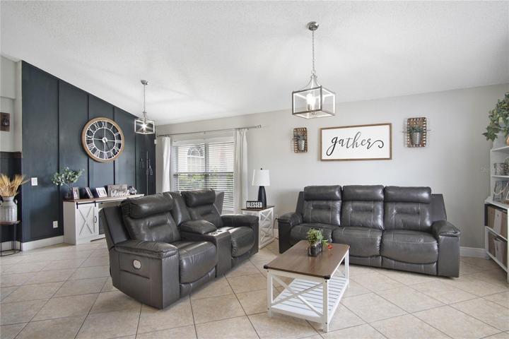 Start your tour in the formal (or flex!) living and dining spaces where the upgrades and designer accents start setting the tone for the rest of this beautiful home!