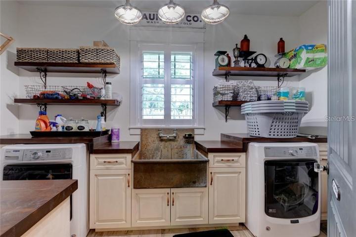 Laundry room with Vintage Farmhouse sink.