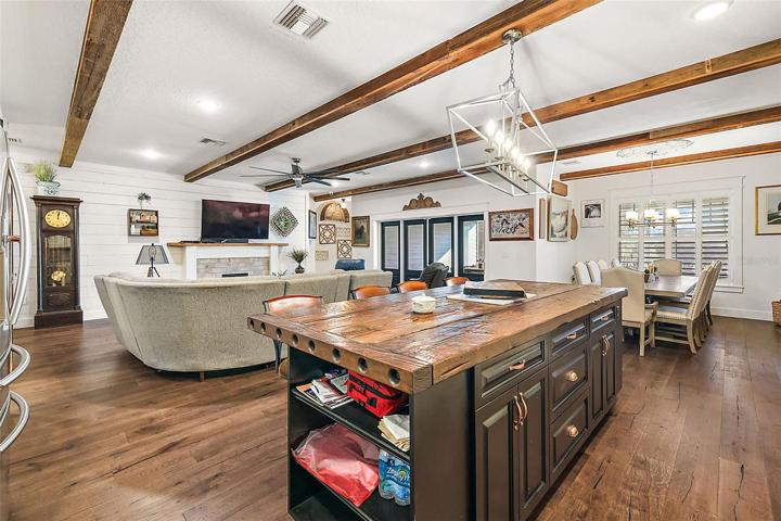 Open Floor Plan with Wide Plank Flooring Throughout entire Home.