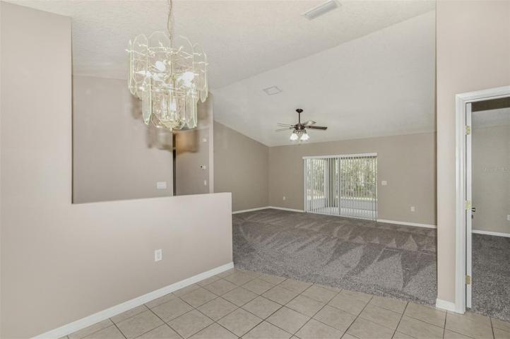 Open Tiled Dining Area To Open Greatroom