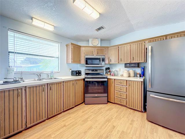 Spacious kitchen with stainless steel appliances