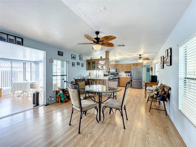 Dining room, kitchen and view into the Florida room