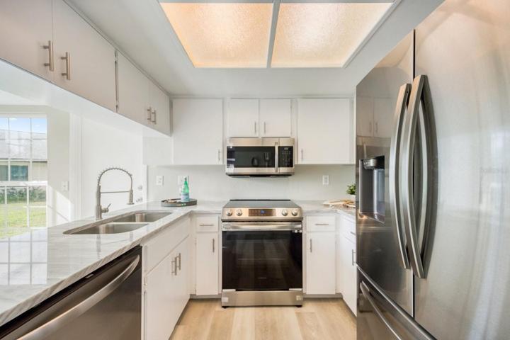 Waterproof luxury vinyl plank flooring is durable & easy to keep clean with no grout lines~