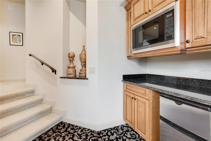 Upstairs foyer with mini refrigerator and microwave