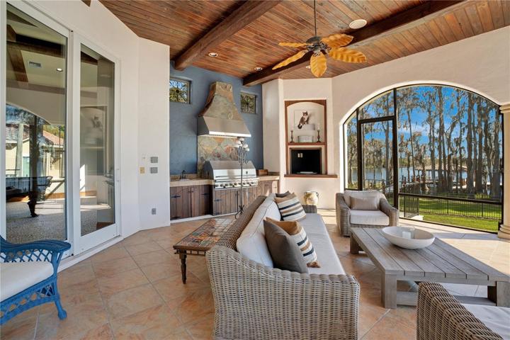 Outdoor summer kitchen from game room access