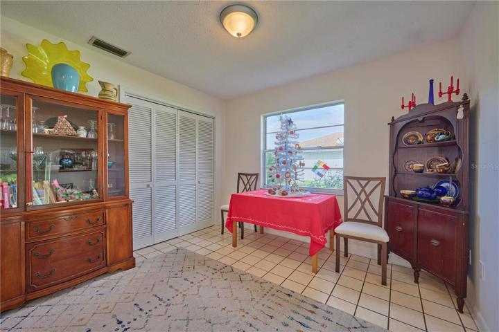 Dining room is open to the kitchen.  Nice size pantry in the rear of the picture!