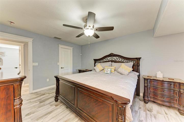 Primary bedroom with walk-in closet