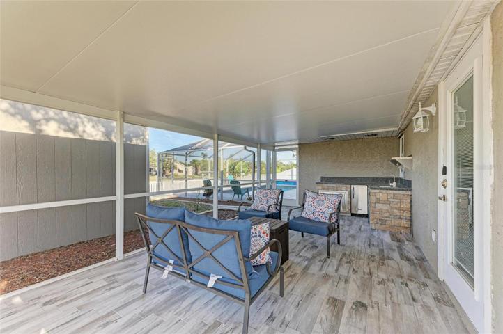 Lanai with outdoor kitchen off master