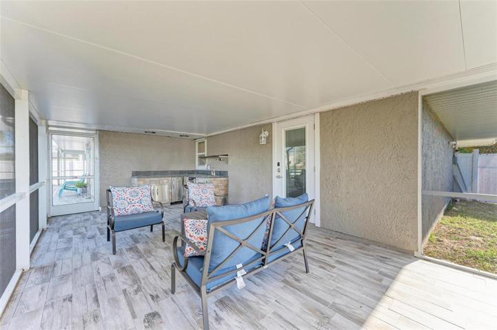 Lanai with outdoor kitchen off master