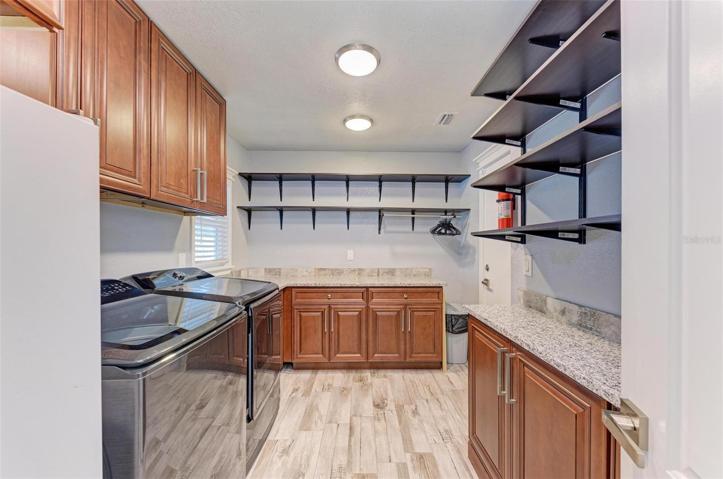 Laundry room with lots of additional storage