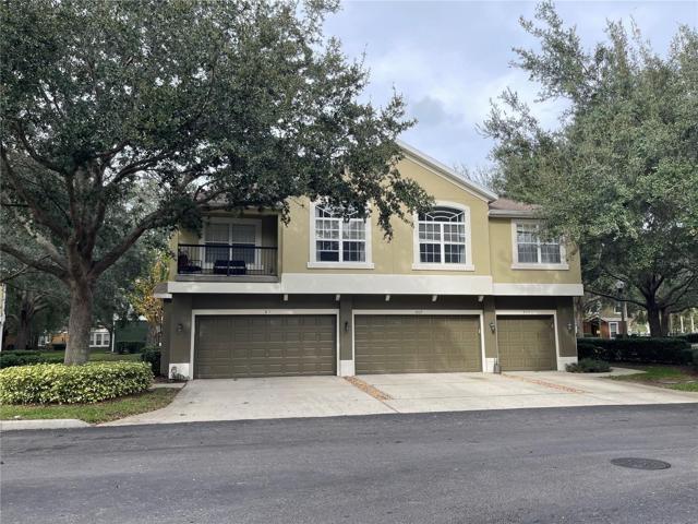 Exterior - home is left to right of top floor, garage is far right side