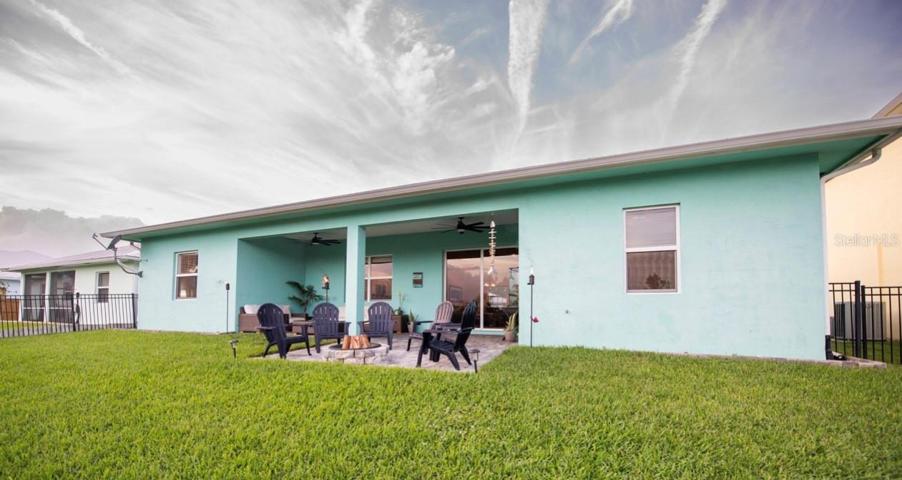 BACK VIEW OF HOME - Expansive backyard with Room for a Pool.