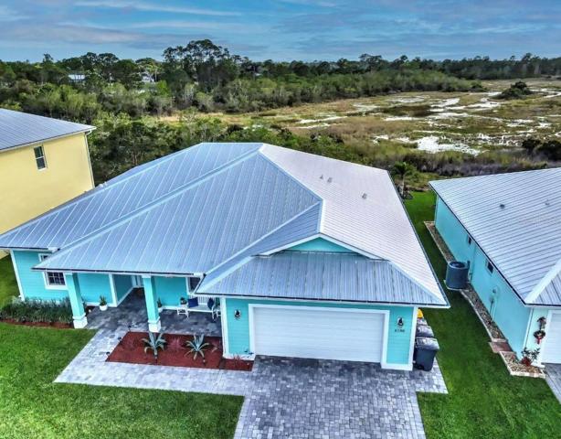FLORIDIAN'S DREAM HOME - Tranquility, Privacy, and Stunning Views from Throughout the Home and from the Backyard & Covered Patio. McArthur Golf Club Ranked One of the Best Golf Courses in the Nation & the Hobe Sound Tennis Center Being Built are nearby. Take a Golf Cart Ride to the Beach which is Minutes from the Home!