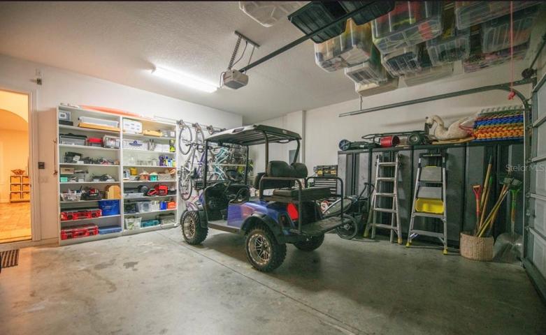TWO CAR GARAGE - STORAGE SYSTEMS - Built-In Storage Systems to Allow Space for Your Vehicles / Golf Cart.